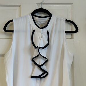Calvin Klein sleeveless blouse. White with navy trim. Size PXL New without tag
